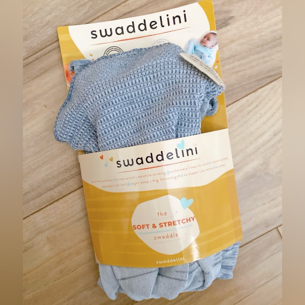 Swaddelini swaddle